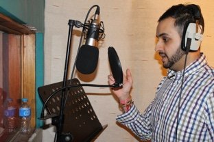 In the vocal booth at Broadwood Studio